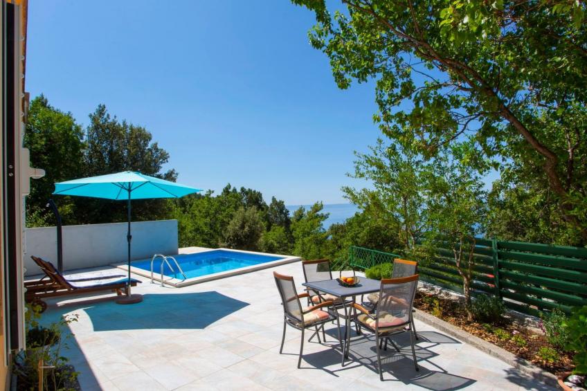 Günstiges Ferienhaus mit Pool und Meerblick - foto 14