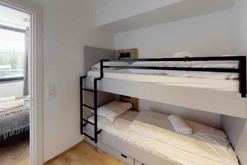 Standard suite for 4 people with bedroom with double bed - foto 6