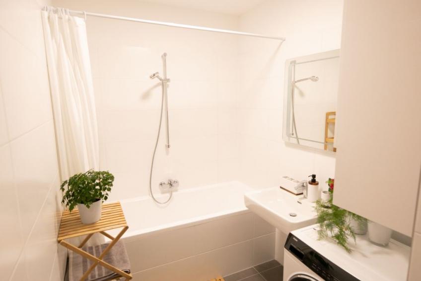 Moderne Wohnung in Kaisermühlen mit Garten und Panoramablick - foto 21