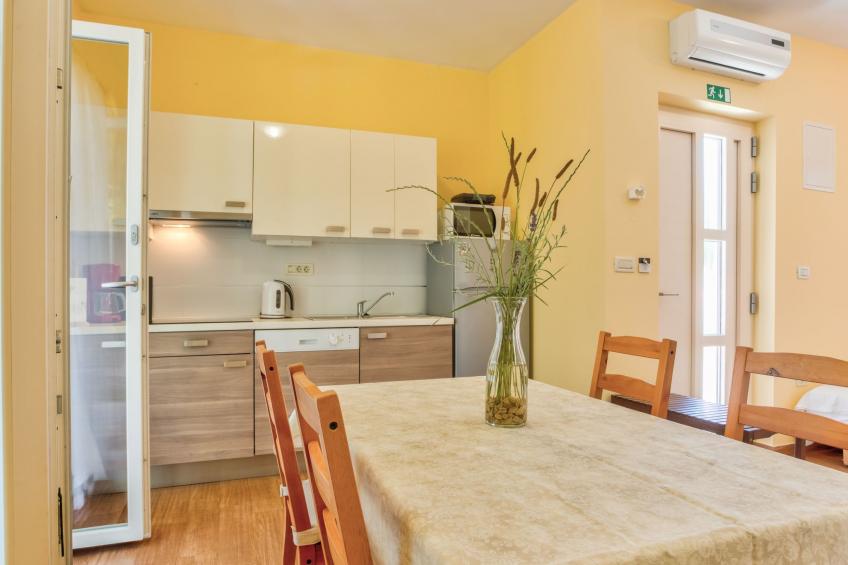 Moderne Ferienwohnung mit Terrasse nah am Strand - foto 14