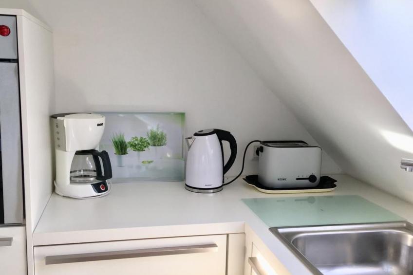 Helle Dachgeschosswohnung an der Flensburger Förde - foto 12