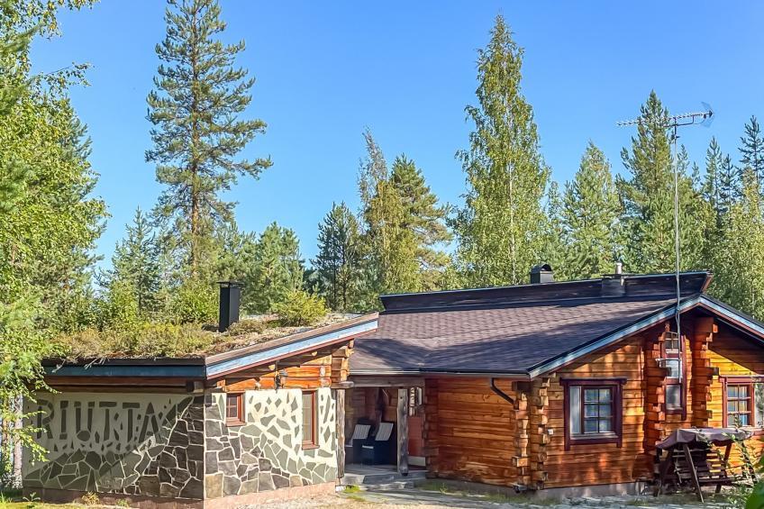 Riutankolo, mustosen lomamökit - foto 2