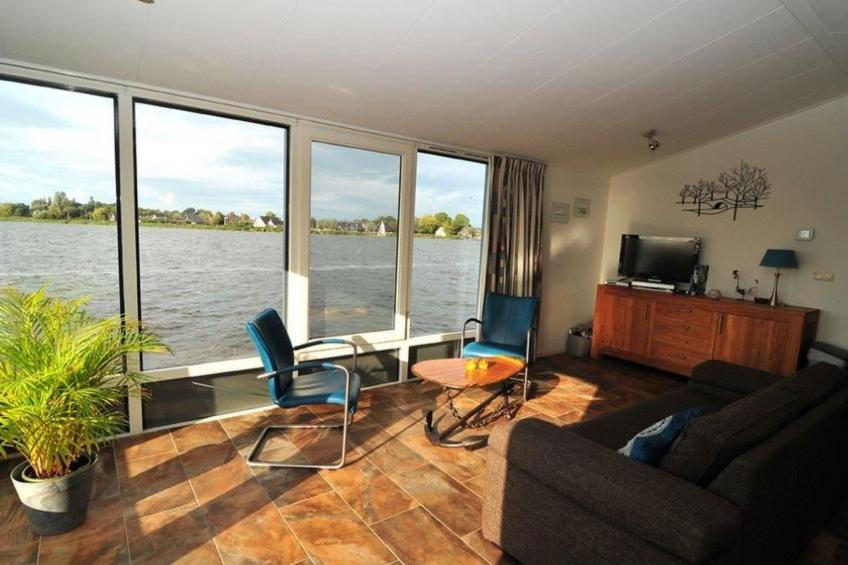 Boot "De Frijheit" mit Blick auf das Wasser - foto 9