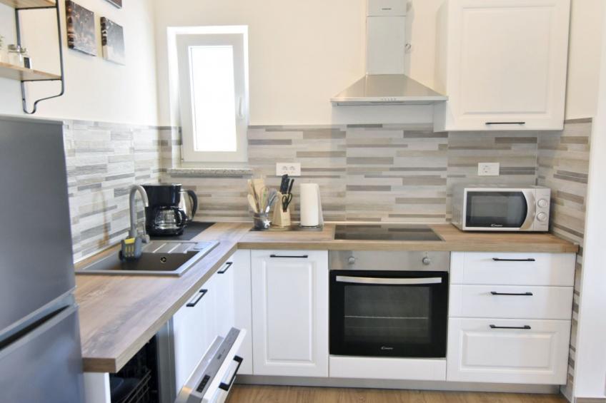 Apartment 2 in einer neuen Villa mit Pool in ruhiger Lage - foto 16