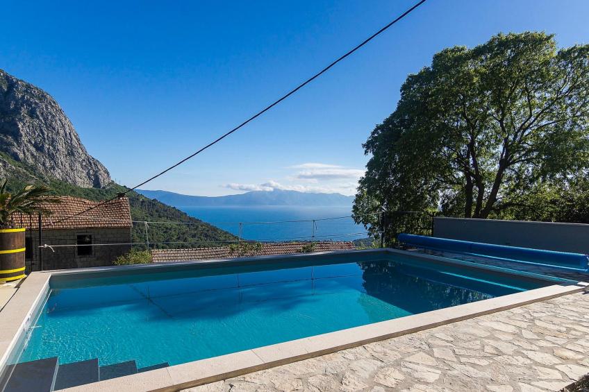 Schönes Steinhaus mit beheiztem Pool, Terrasse mit Meerblicl in ruhige Lage - foto 9