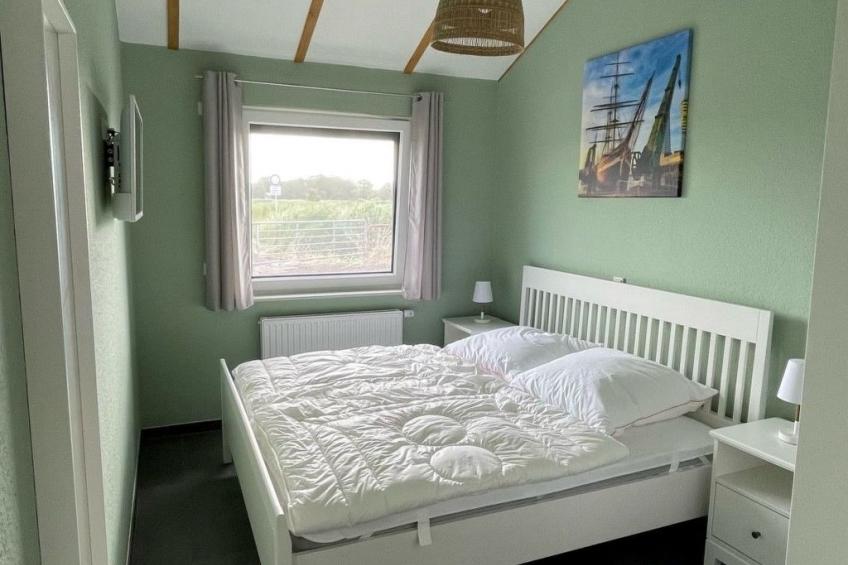 G1 Eingezäuntes Haus mit Kamin in Eckwarderhörne - foto 9