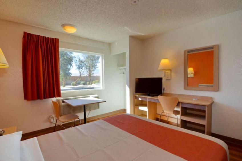 1 Queen Bed  Mini Fridge