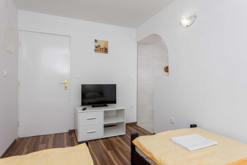 Apartments Djurkovic - Two-Bedroom Apartment with Shared Terrace and Sea View - foto 6