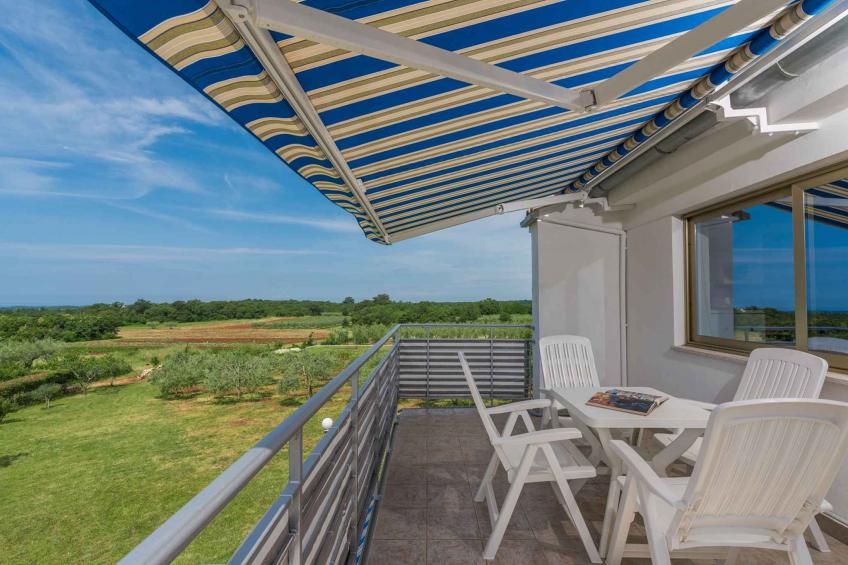 Vakantiewoning met airconditioning en balkon - BF-RWK75