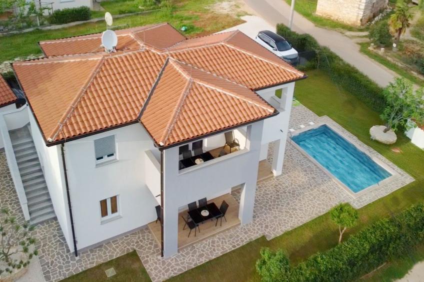 Apartment 2 in einer neuen Villa mit Pool in ruhiger Lage - foto 38