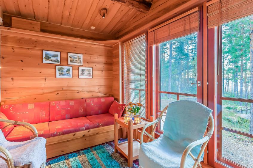 Riutankolo, mustosen lomamökit - foto 15