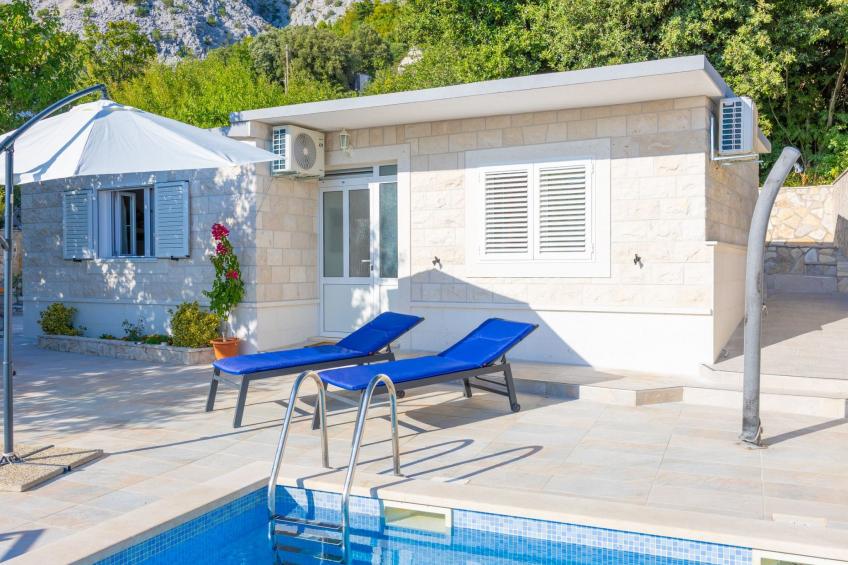 Günstiges Ferienhaus mit Pool und Meerblick - foto 40