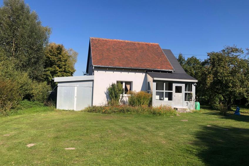 auf einem Gutshof mit eigenem Garten in ländlicher Umgebung