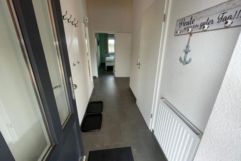 G1 Eingezäuntes Haus mit Kamin in Eckwarderhörne - foto 23