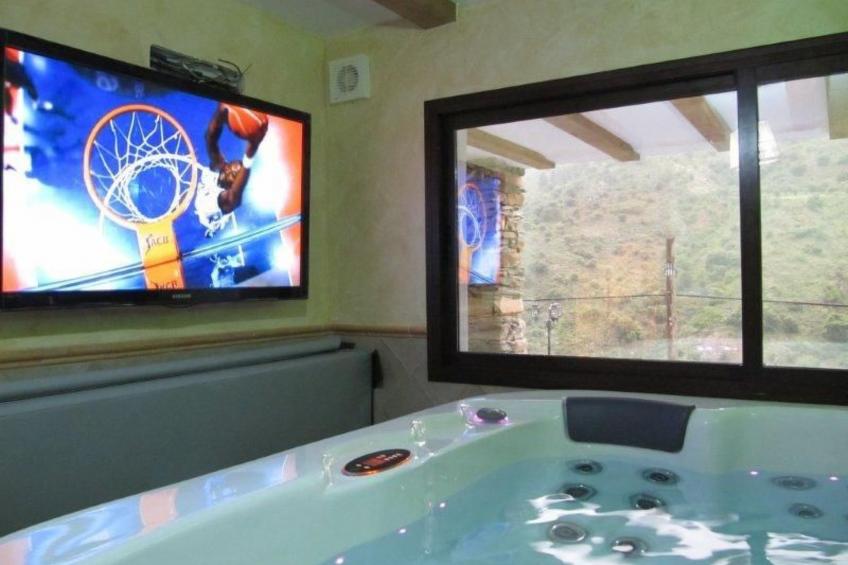 Haus mit integrierter Felswand und Jacuzzi - foto 5