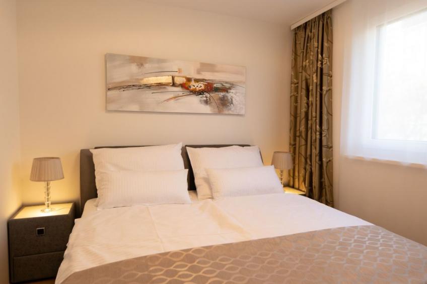 Moderne Wohnung in Kaisermühlen mit Garten und Panoramablick - foto 8