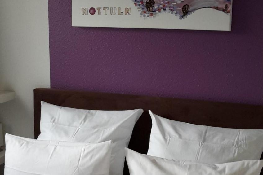 Wohnung im Erdgeschoss mit Terrasse und Stellplatz