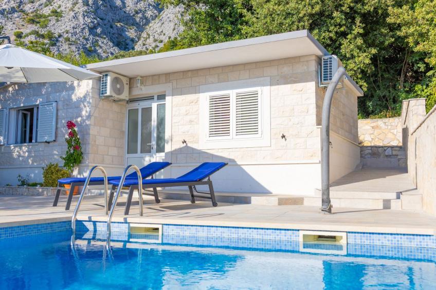 Günstiges Ferienhaus mit Pool und Meerblick - foto 32