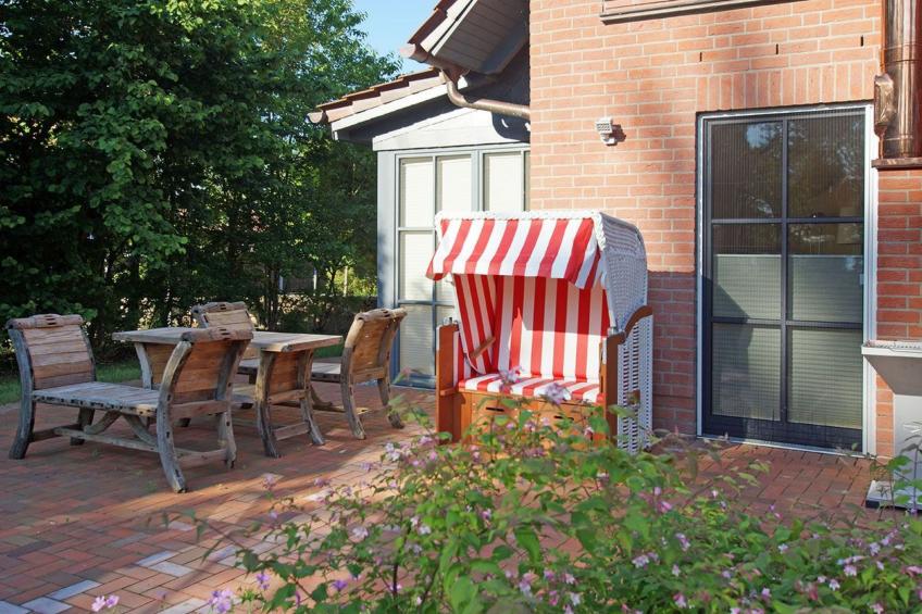 Seegang mit eingezäuntem Grundstück