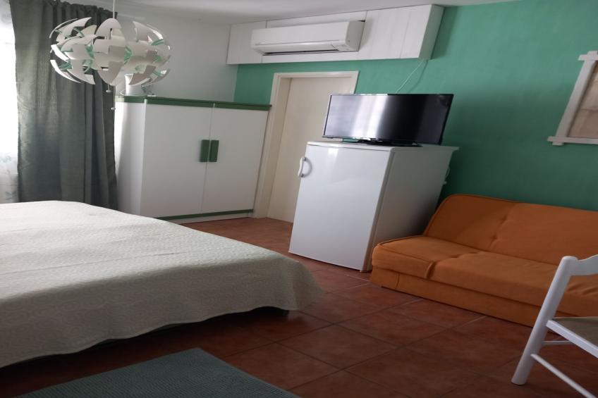 Guest House Green Corner Supetarska Draga - Triple Room with Terrace and Sea View - foto 23